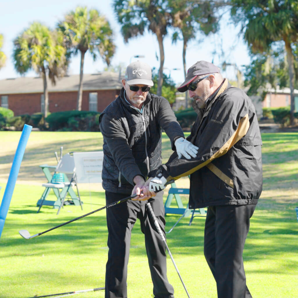 Coach Joe working one-on-one with a student