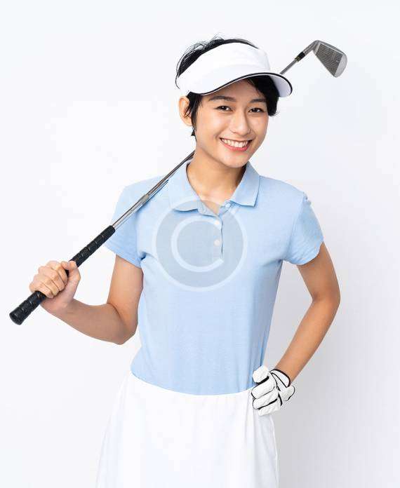 A female golfer holding a golf stick, ready to take a swing, with a copyright logo.
