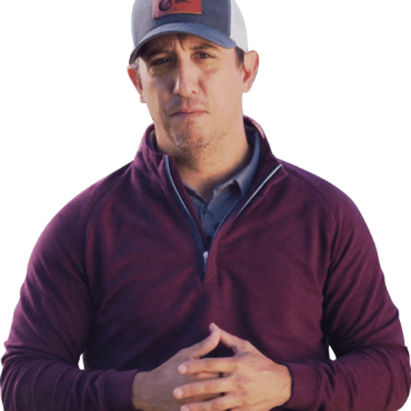 Joe DiChiara, golf coach, demonstrating expert technique and providing coaching on the golf course.